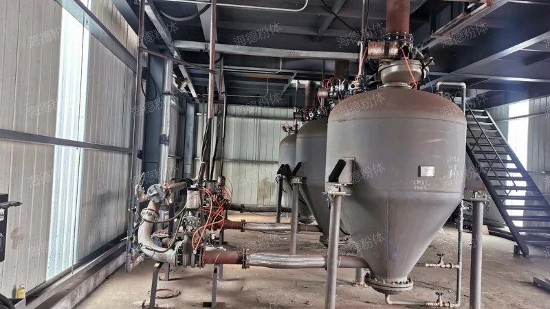 Gypsum ash conveying system